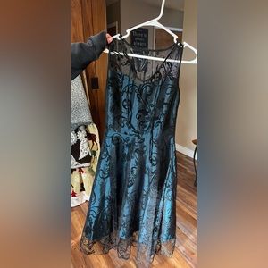 Beautiful silk and lace formal prom dress. Green and black size med